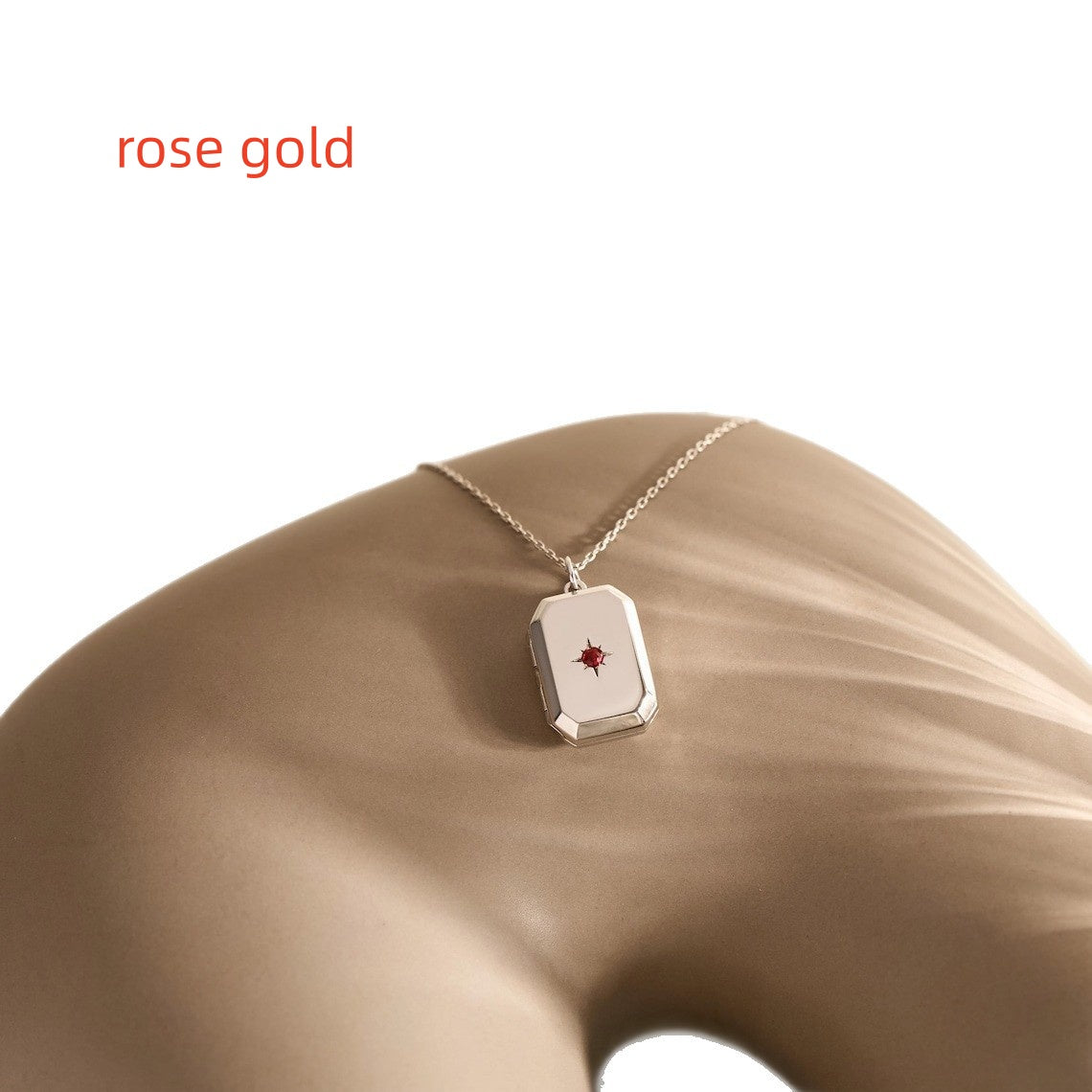 A Pendant Necklace With Birthstones Embedded In It